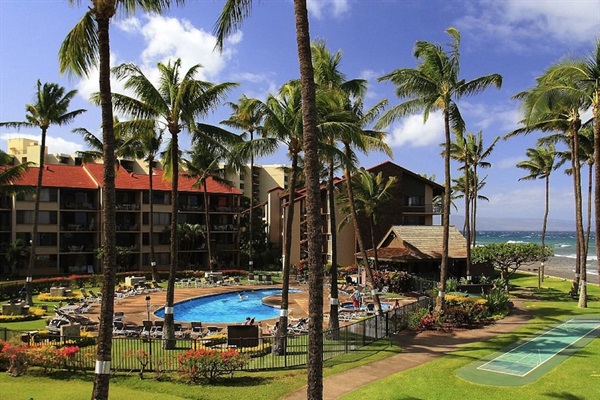 2 pools & 2 hot tubs on the grounds  See the lawn shuffleboard on the right?