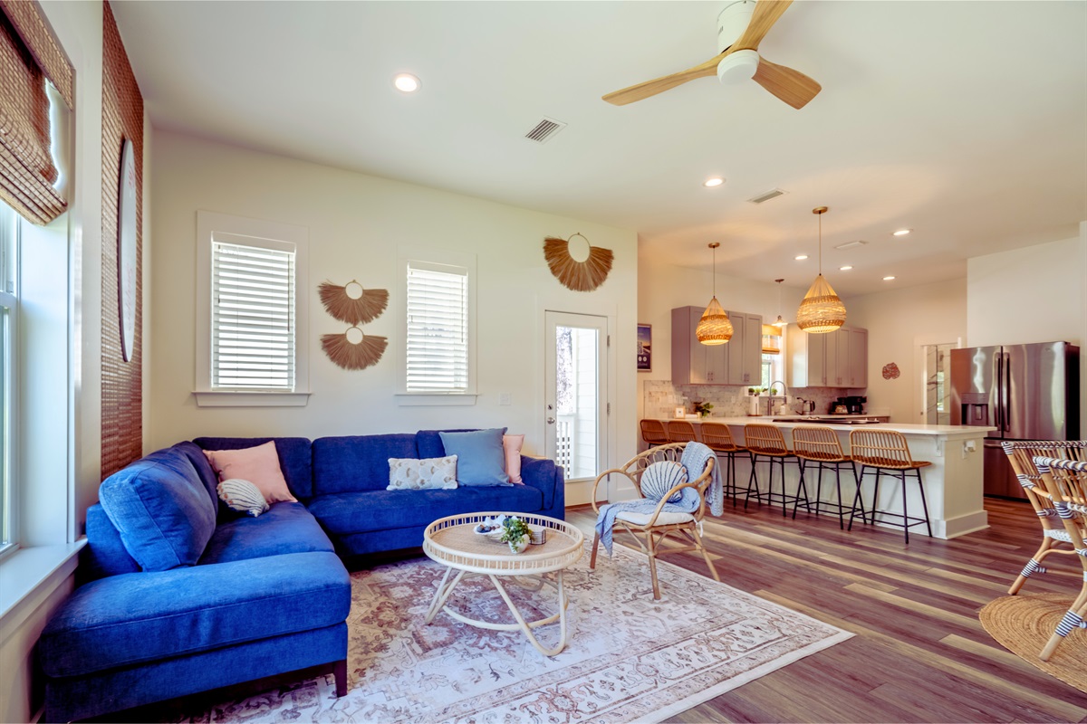 Cozy living room with comfy seating and smart TV—ideal for relaxing after a beach day