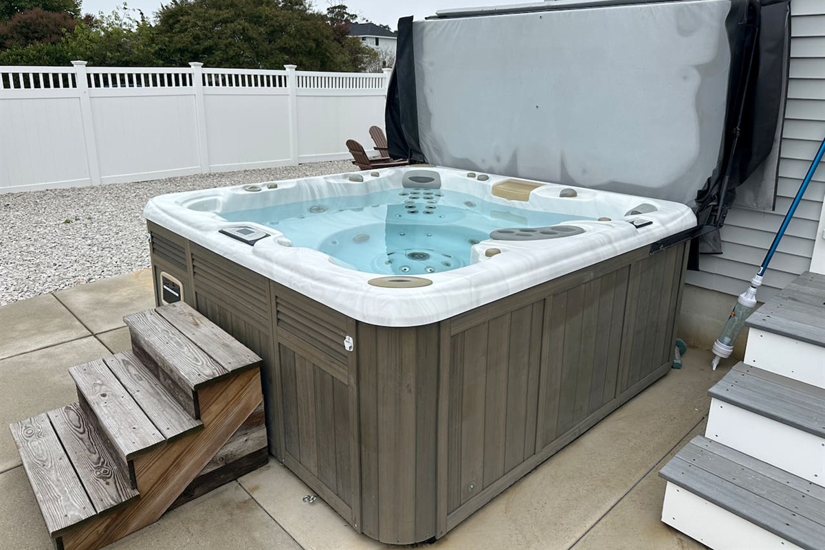 Dive into pure bliss in our premium hot tub, perfectly situated for a soak after a long day of beach adventures. This private, fenced-in backyard feature ensures your vacation is as relaxing as it is memorable.