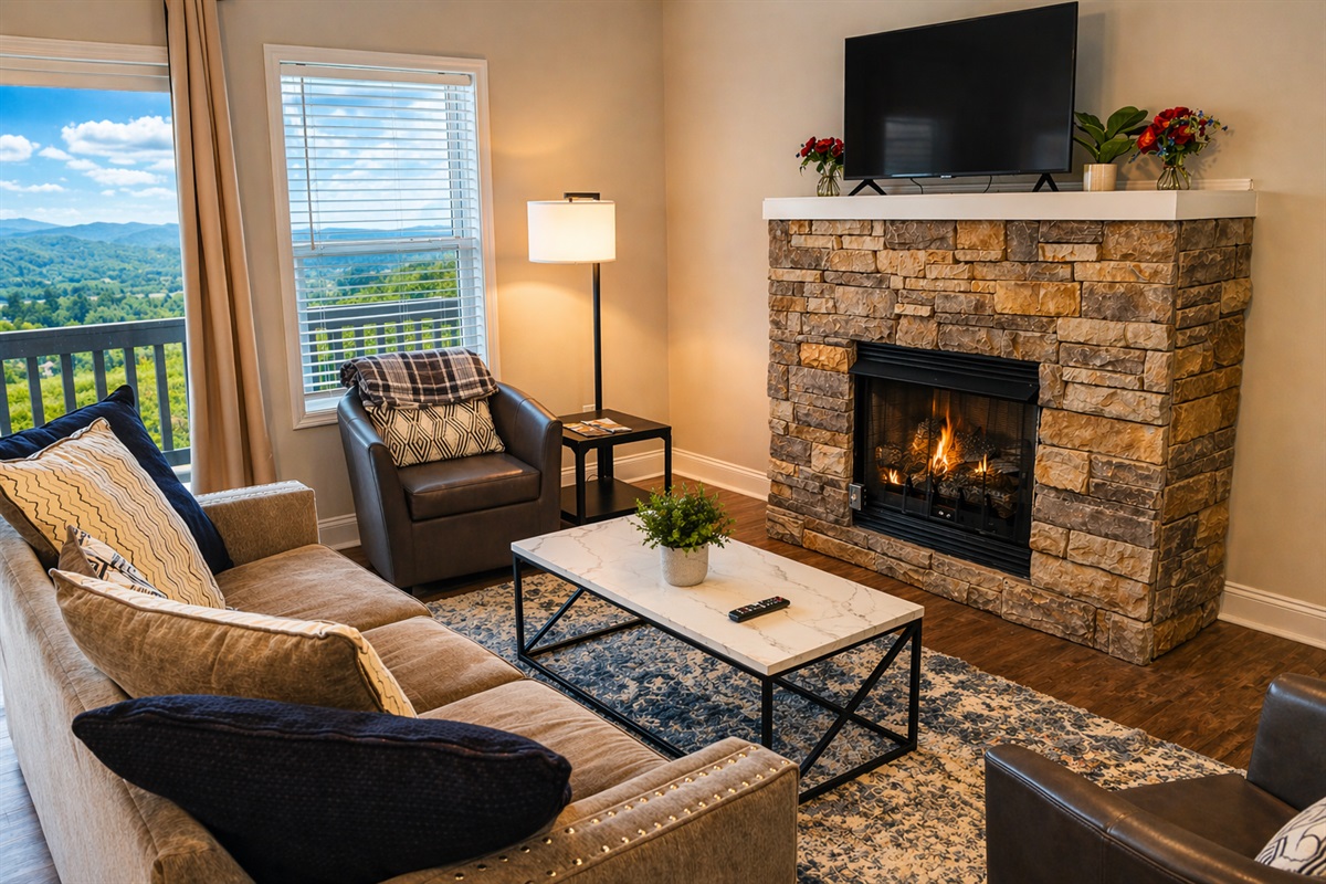 Enjoy a cozy night by the fireplace or take in the golf views from this bright, open living space.