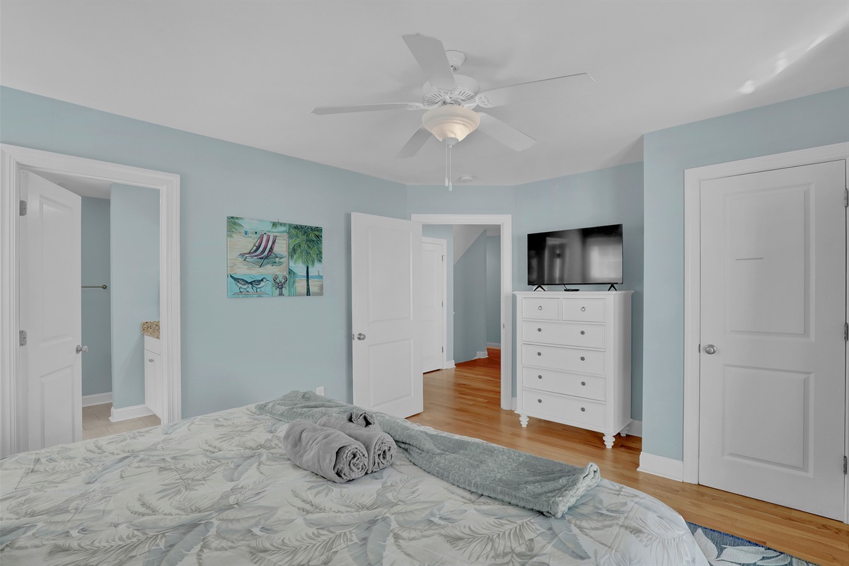 Coastal decor and serene blue tones create a peaceful retreat for your guests.