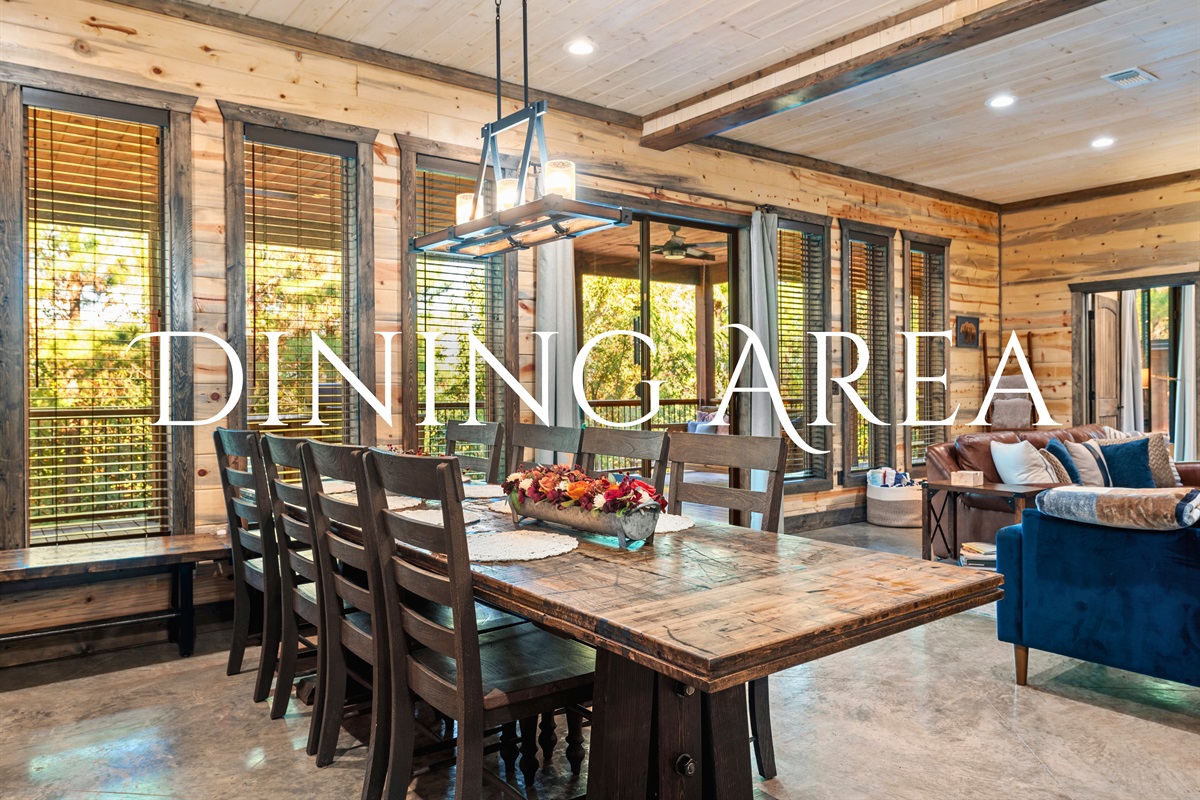 The dining area is perfect for family meals or a fun game night, with plenty of natural light and space for everyone to gather.