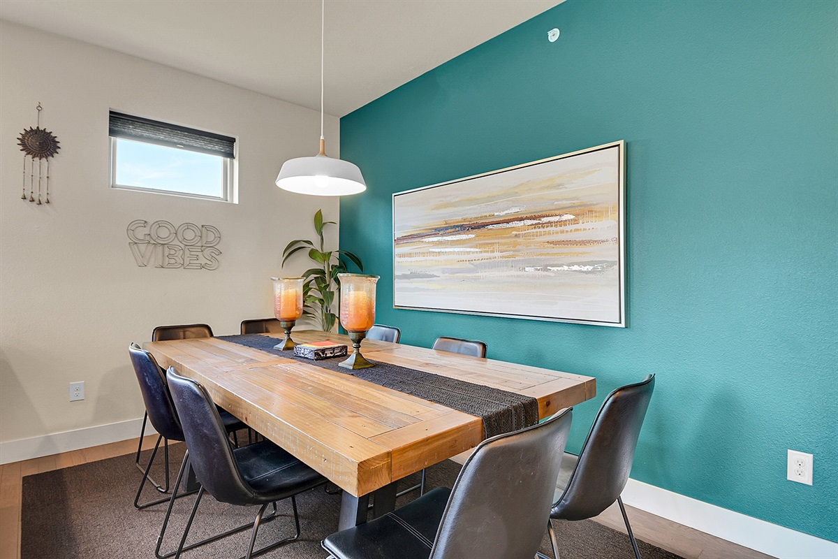 Dining room has room for 8, plus an overflow table stored in the Green Bedroom walk-in closet, which expands seating to 12, plus 3 at the island for a total of 15 