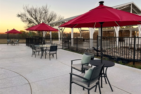 Patio seating in the pool side area, have a chat or meal.