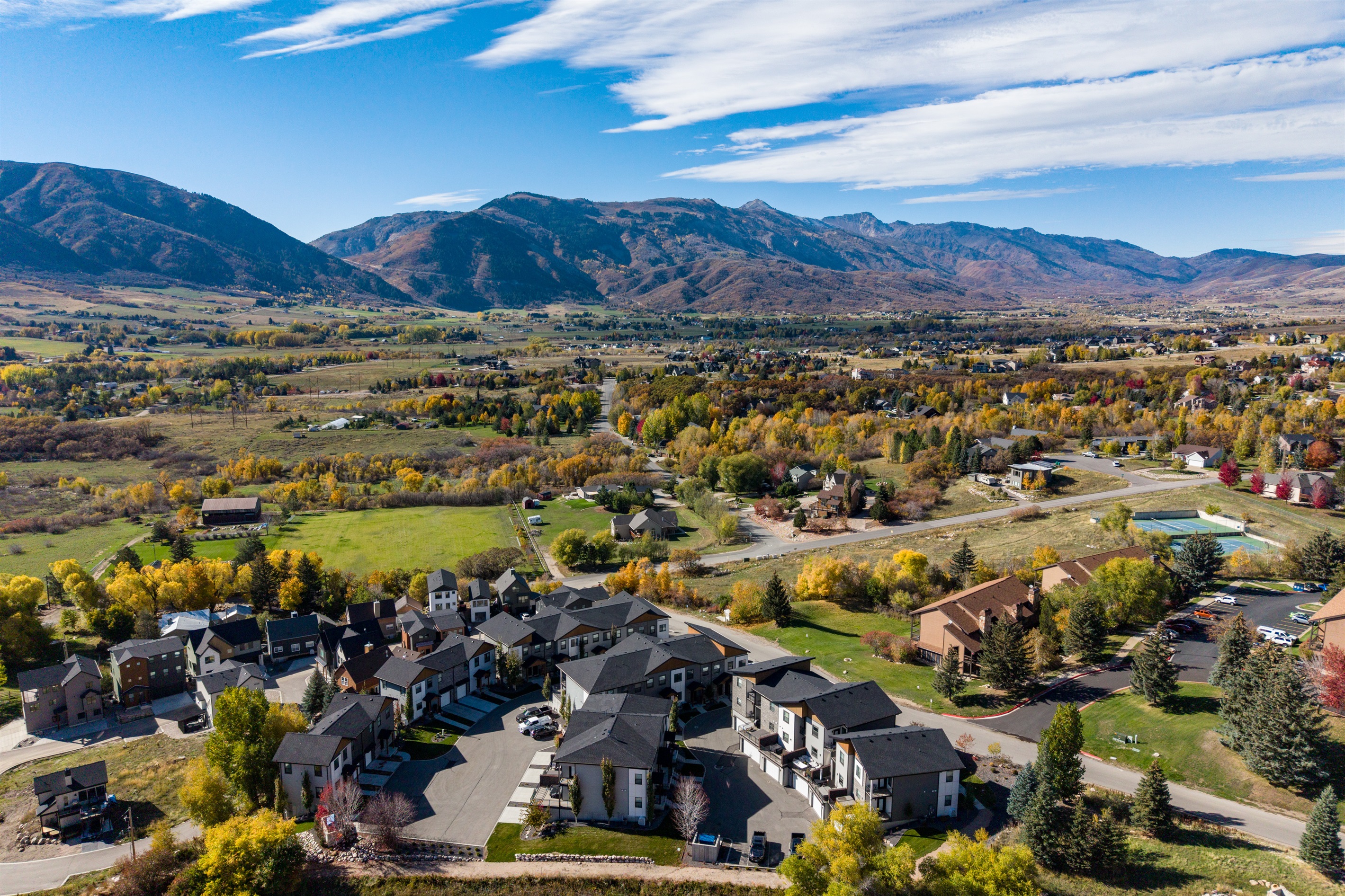 Elevated view of the community and nearby mountains.