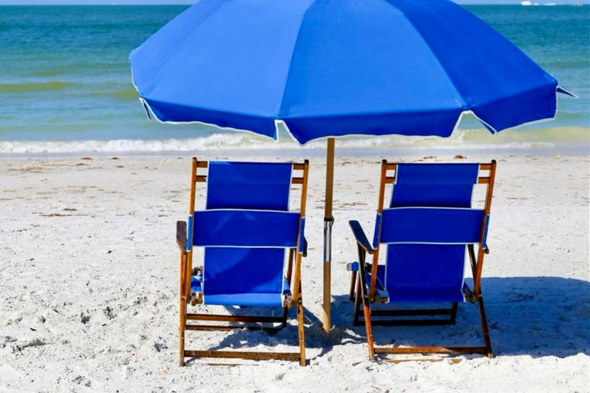 Beach chairs and umbrella