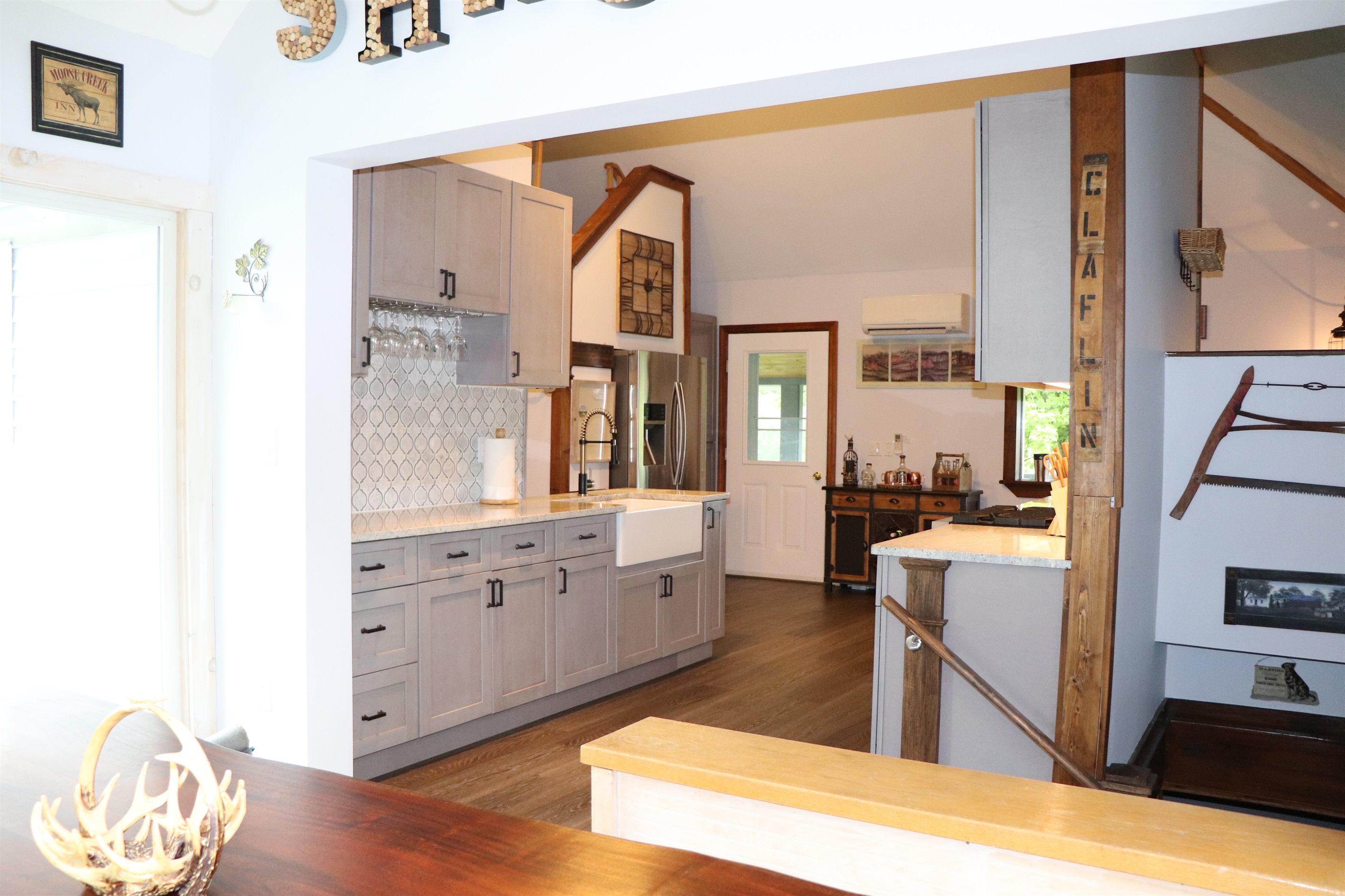 The view from the dining room into kitchen