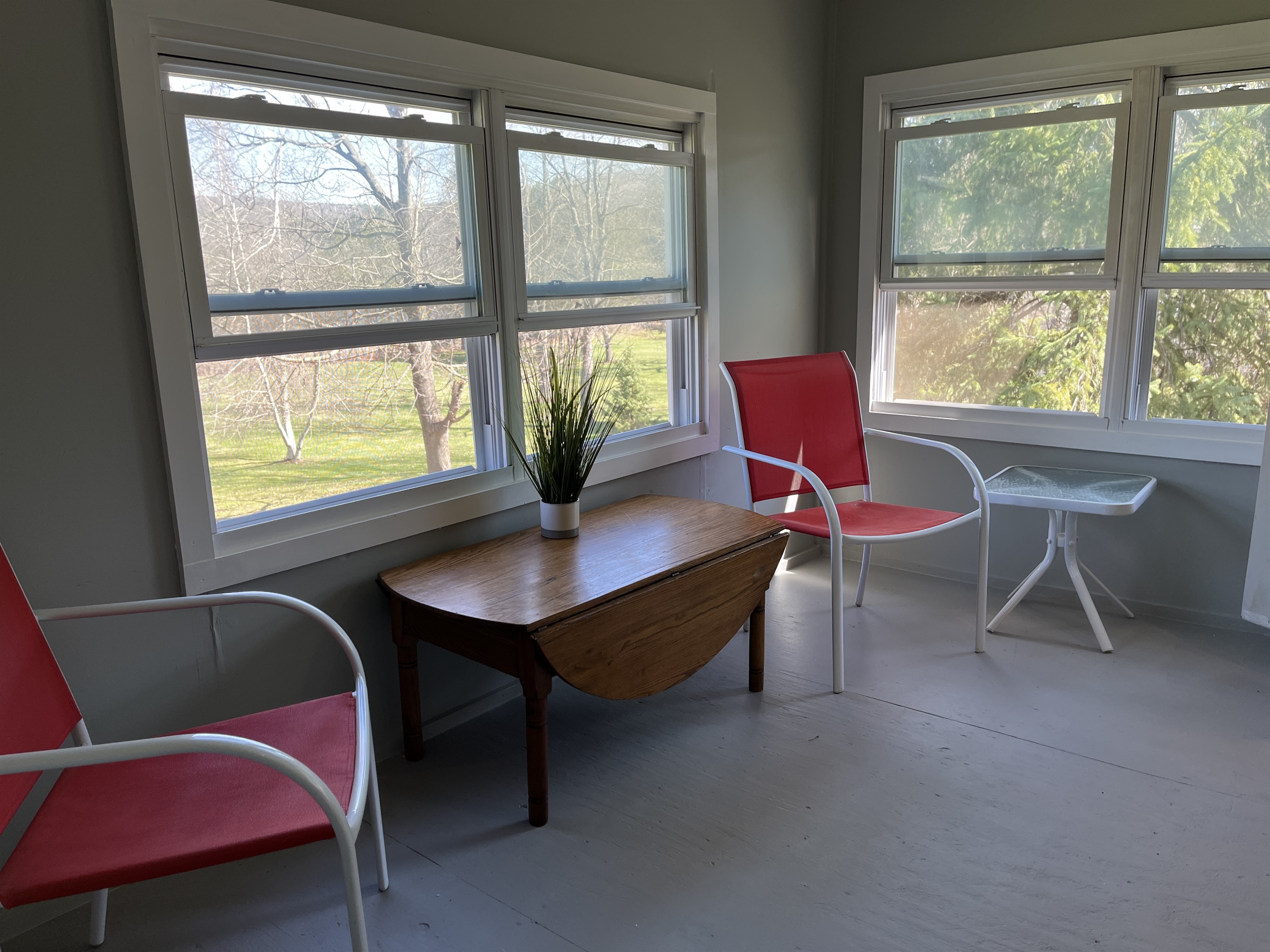 Sunroom overlooking backyard