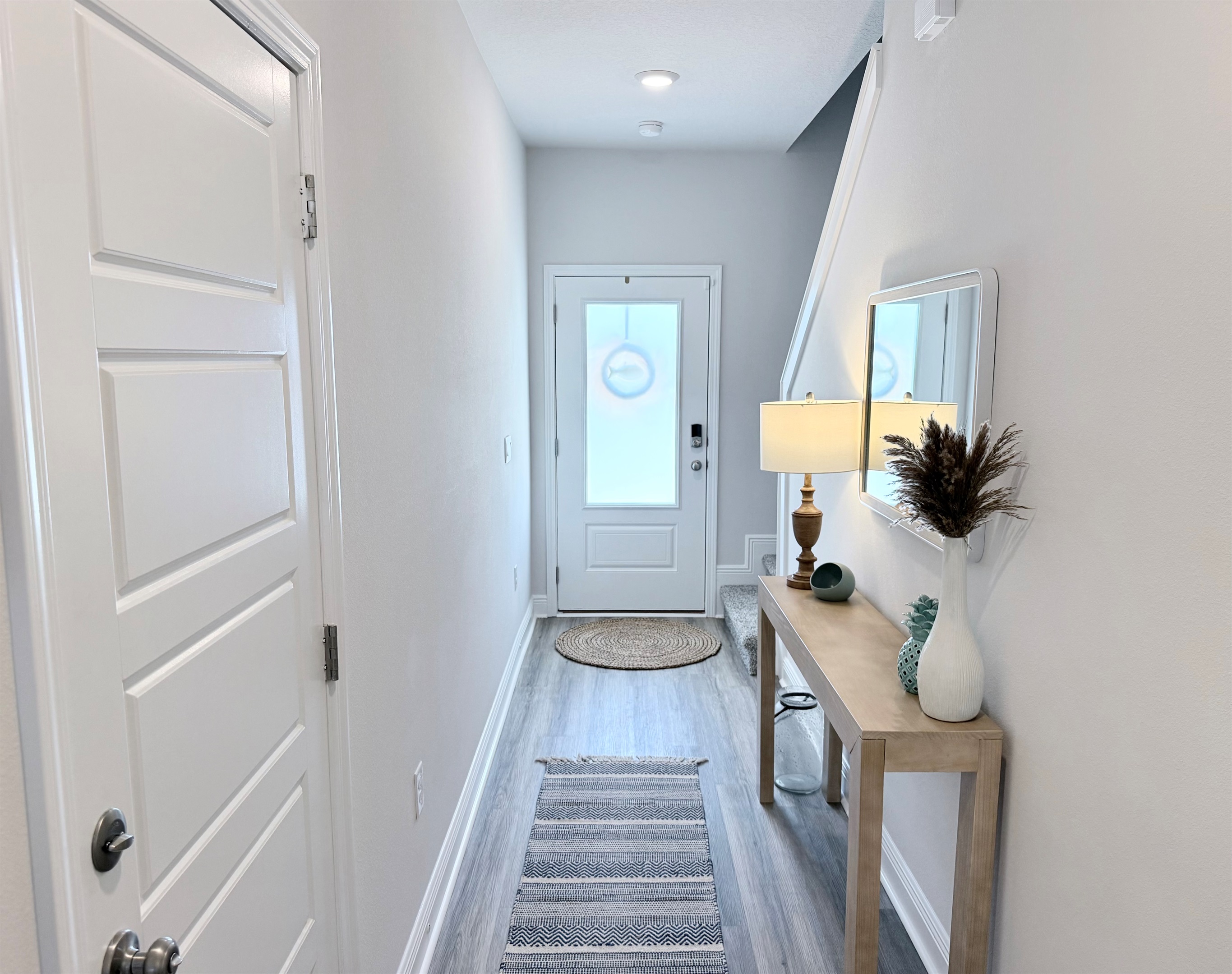 Entryway and hallway leading into the great room