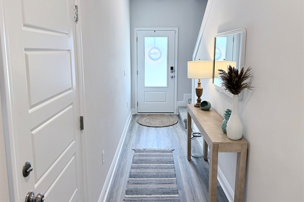 Entryway and hallway leading into the great room