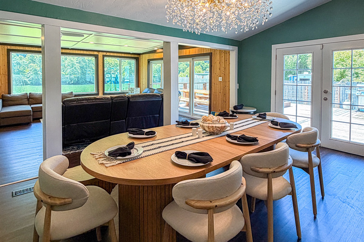 The dining area seamlessly blends comfort and sophistication, creating the perfect setting for intimate dinners and festive gatherings alike.