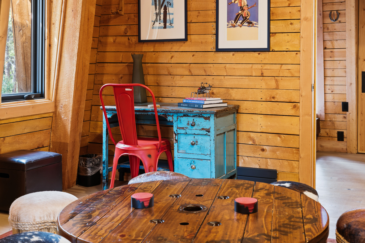 Custom game table and desk in upper level multi-use living area. 