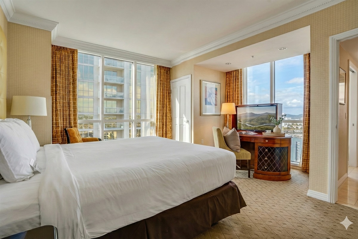 A dreamy bedroom with stunning city views!  