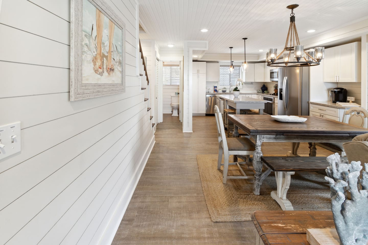 Kitchen, dining, and living all connect on the main floor &mdash; designed for groups who want to be together.