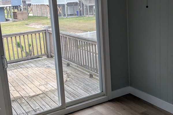 Bedroom will soon have a queen bed, nightstands and dresser with sliding doors on to the back deck. This room connects to the large bathroom with a tub.