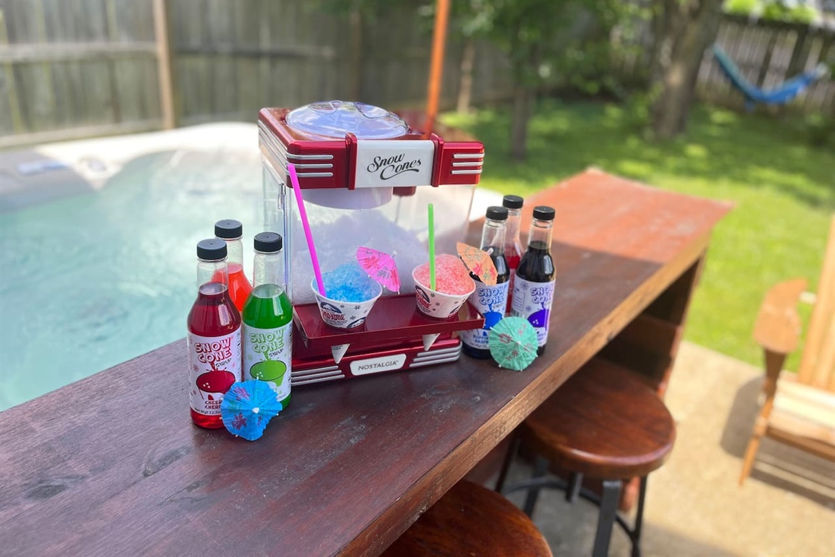 Beat the heat with a sno cone while relaxing on the back patio! 