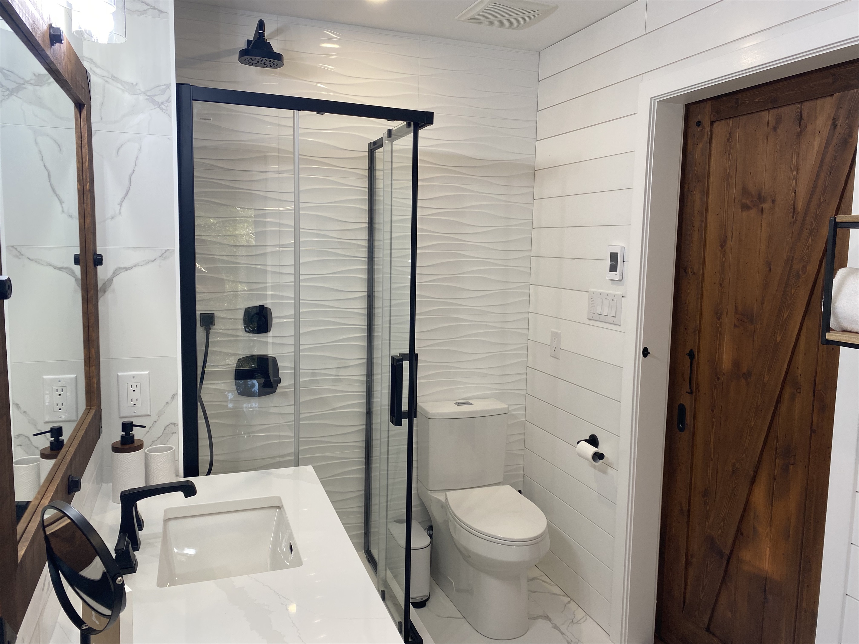 The ensuite bathroom has full shower as well as bath tub for your use