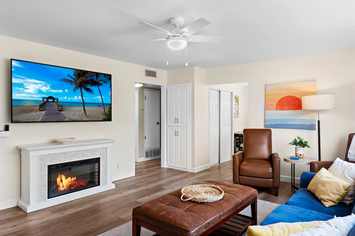 Just inside the front door is a spacious Living Room with lots of natural light and plenty of seating with a king-sized sofabed and two recliners.  It also offers a fireplace and large-screen TV.