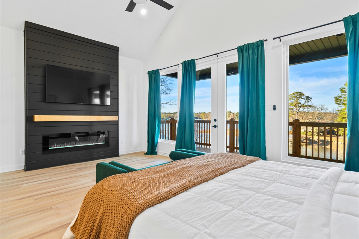 Large windows bring in natural light and soft views of the outdoors.