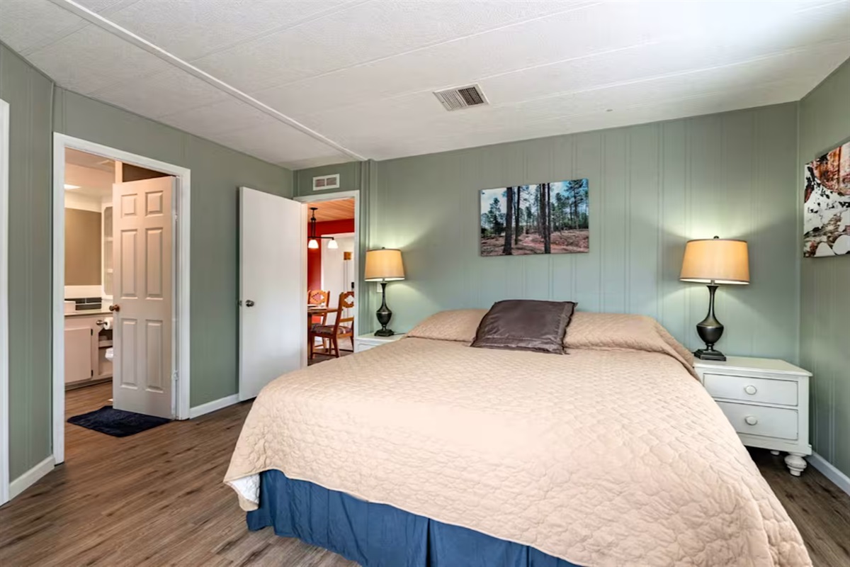 Comfort awaits after every adventure in the serene primary bedroom, conveniently located off the living and dining areas and complete with a private ensuite.