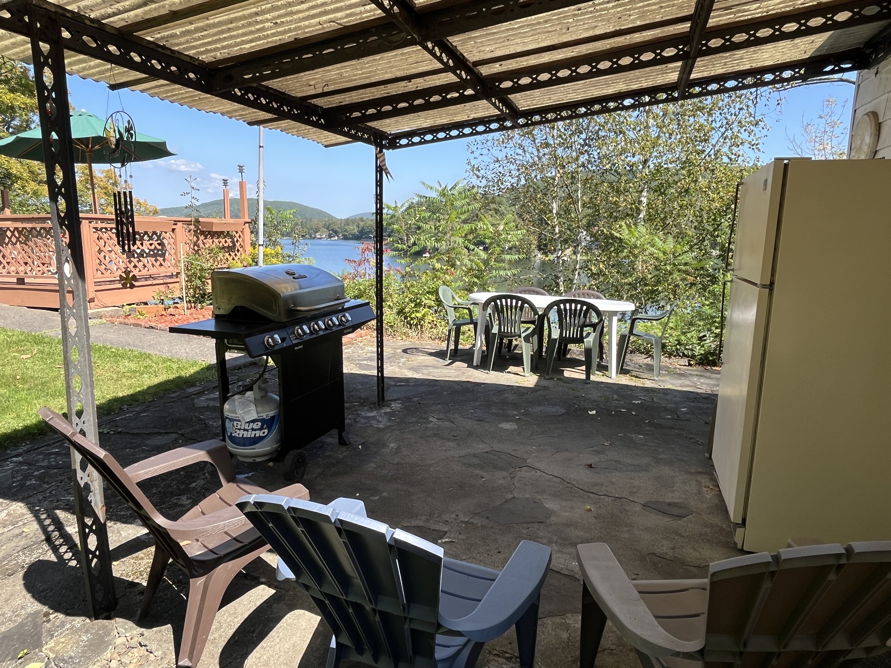 Covered grill station and outdoor fridge