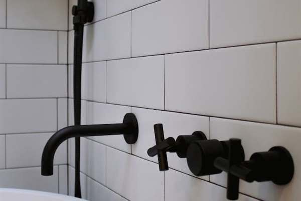 Tile detail with Watermark fixtures made in Brooklyn NY