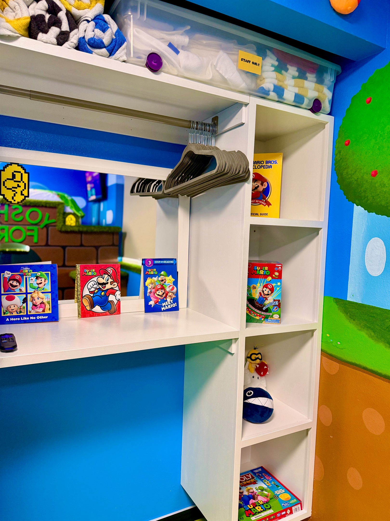 Clothing storage and space for more Mario-themed games and activities!