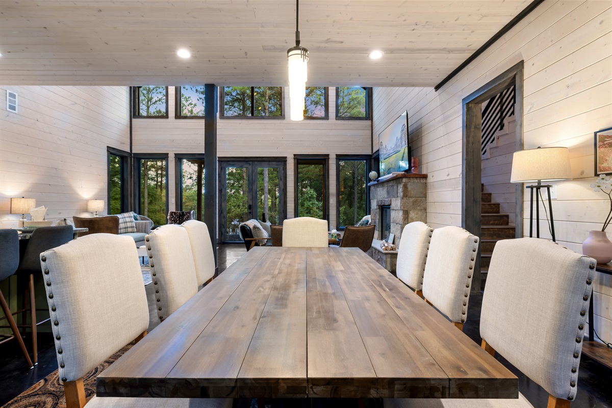 Large dining table with seating for eight, ideal for shared meals, celebrations, and memorable moments with family and friends.