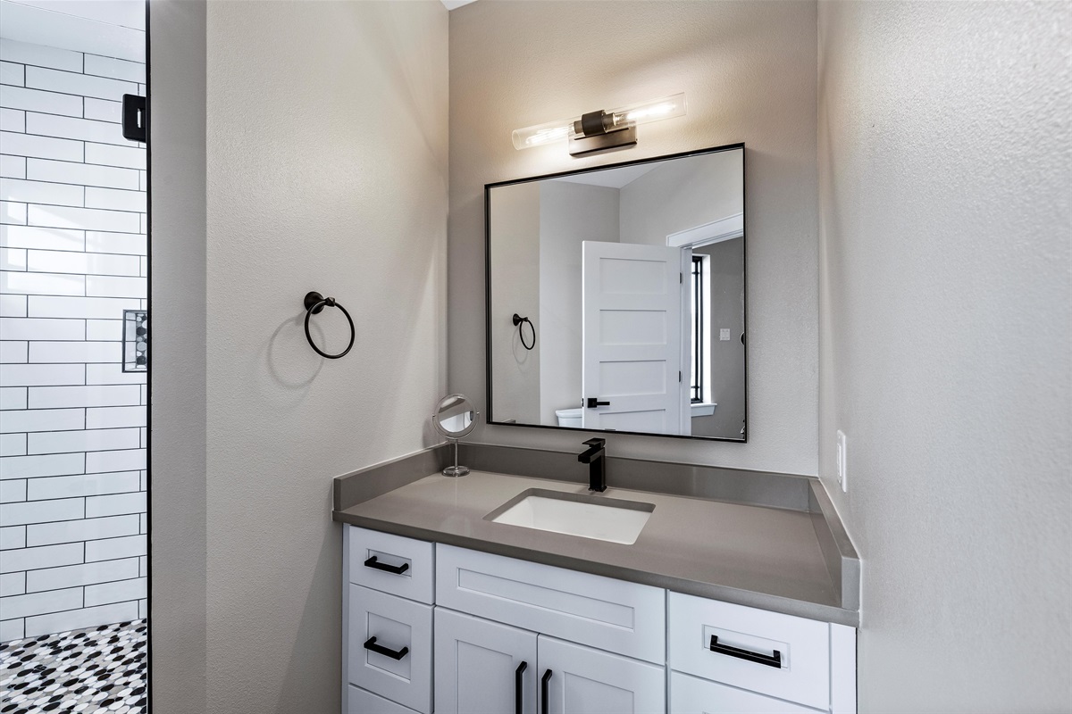 Bathroom Oasis: Modern design with sleek fixtures, perfect for a refreshing retreat!