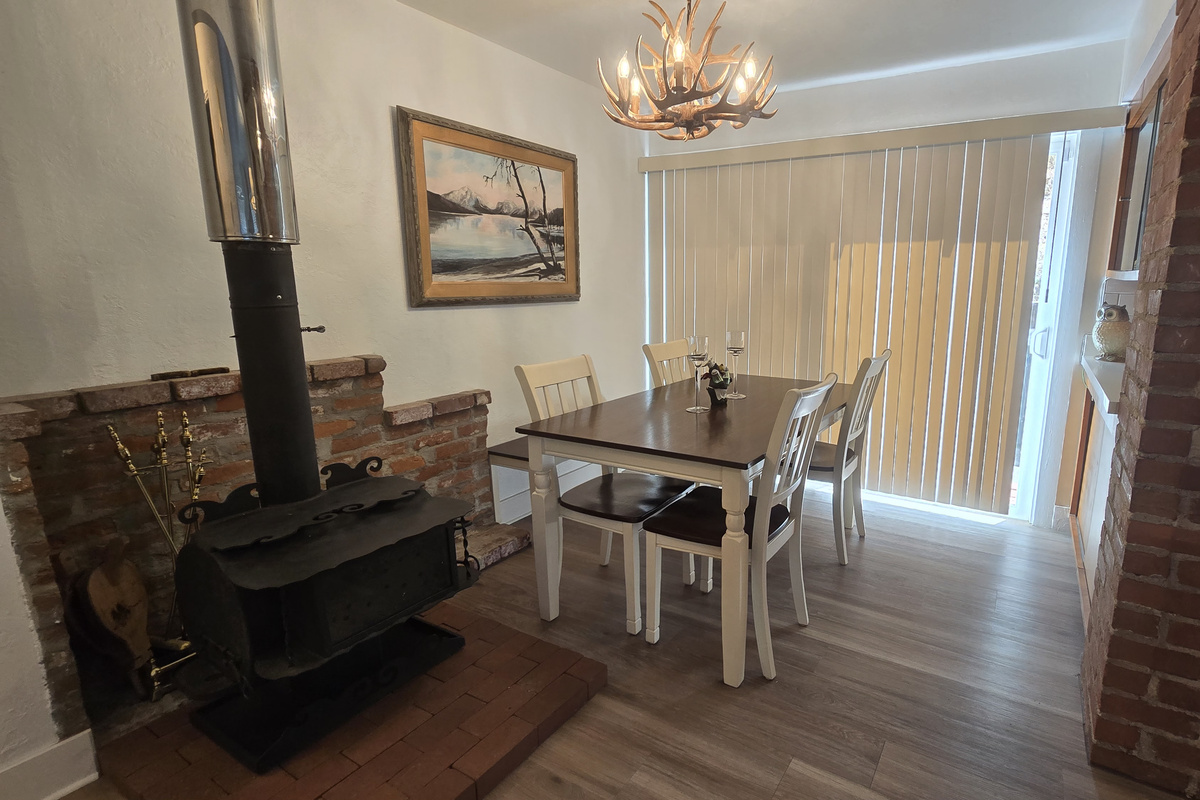Wood burning stove and Dinning area. 
