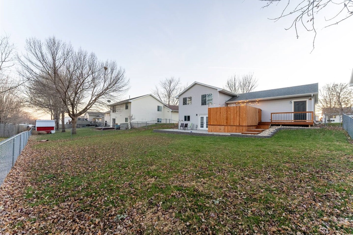 View of house from corner of back yard. 