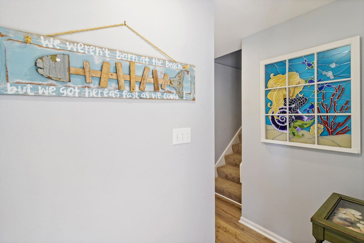 Step into the ground-floor foyer &mdash; drop your beach bags, rinse off at the outdoor shower, and head upstairs.