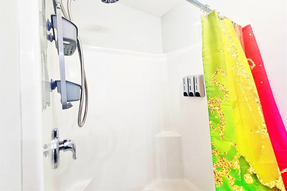Brand new spa handheld shower head and dispensary.