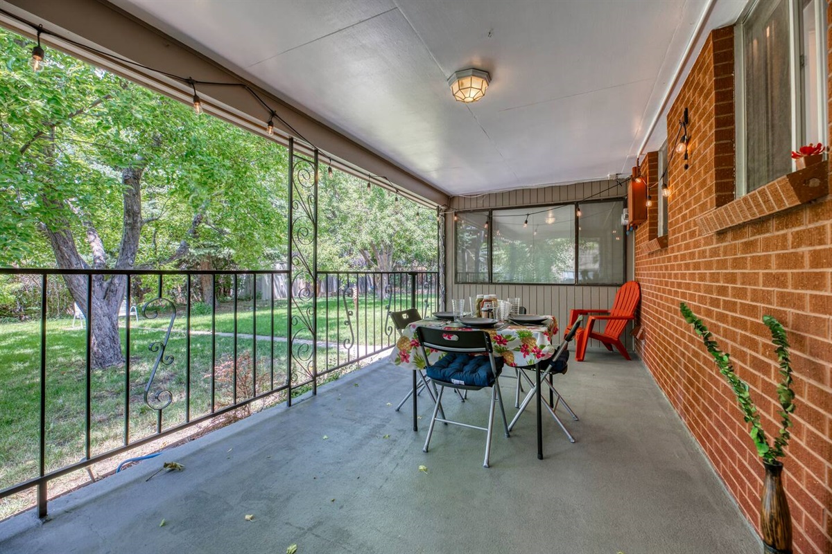 Private Veranda overlooking the large fenced in backyard.