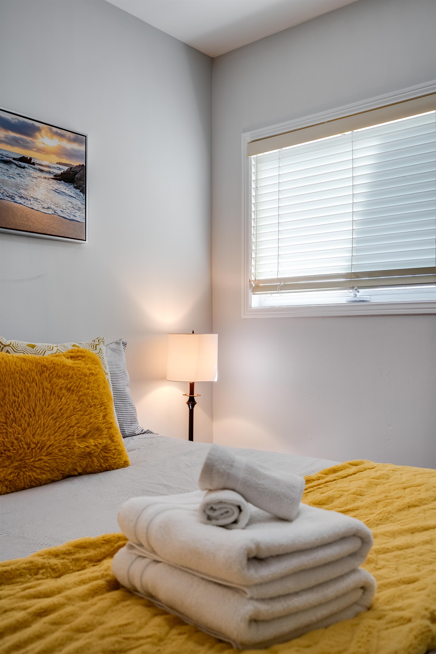 A Queen bedroom with serene primary suite with full lake exposure