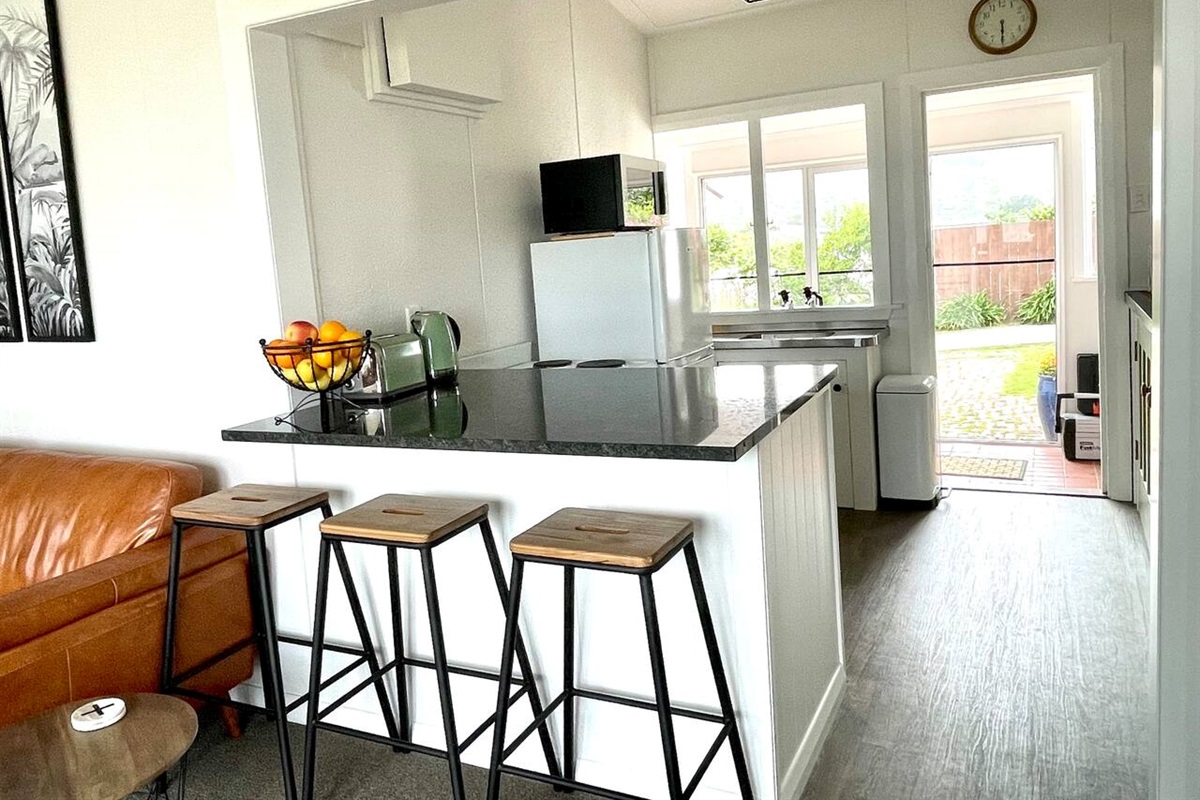 Breakfast bar area with view out to the courtyard.