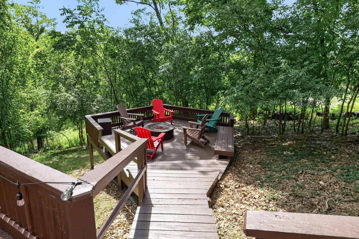 Outdoor seating area beneath the stairs
