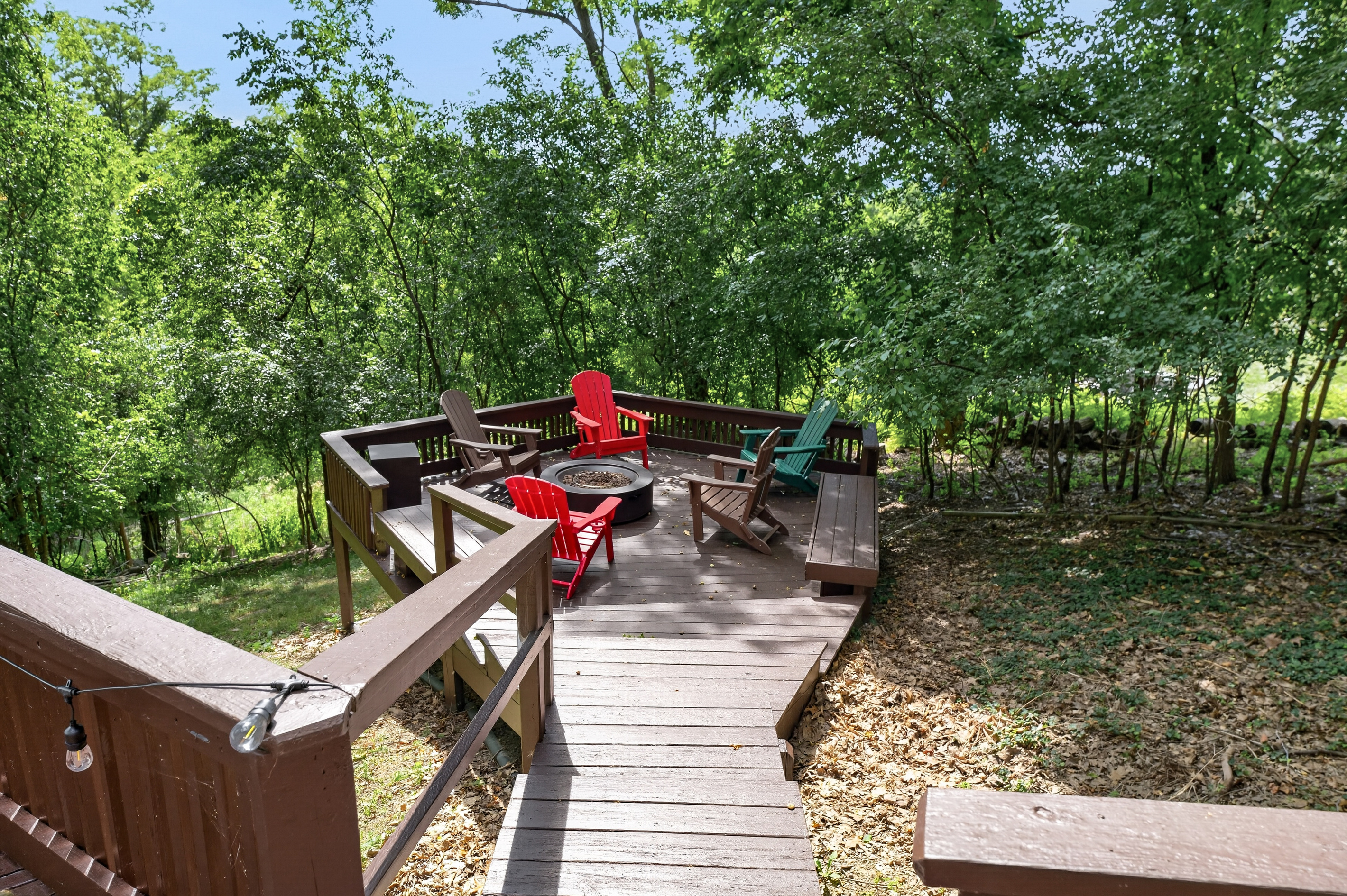 Outdoor seating area beneath the stairs