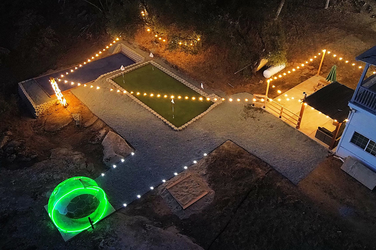 Experience our ultimate private resort! Challenge friends to mini-golf or bocce ball, then stargaze from our unique geodesic dome. As evening falls, unwind under the pergola with sunset cocktails. Your perfect retreat awaits&mdash;book your stay today!