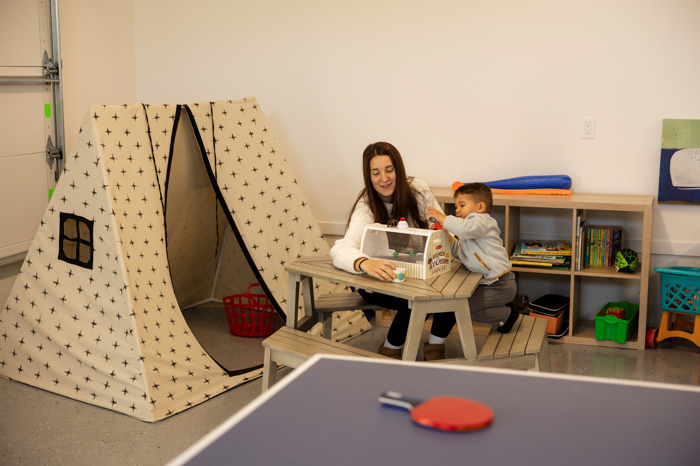 {Garage} A dream play space for little adventurers — stocked with Legos, books, toys, and plenty of room to play.”