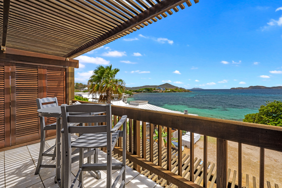 Pull up a seat and enjoy front-row views of Cowpet Bay.