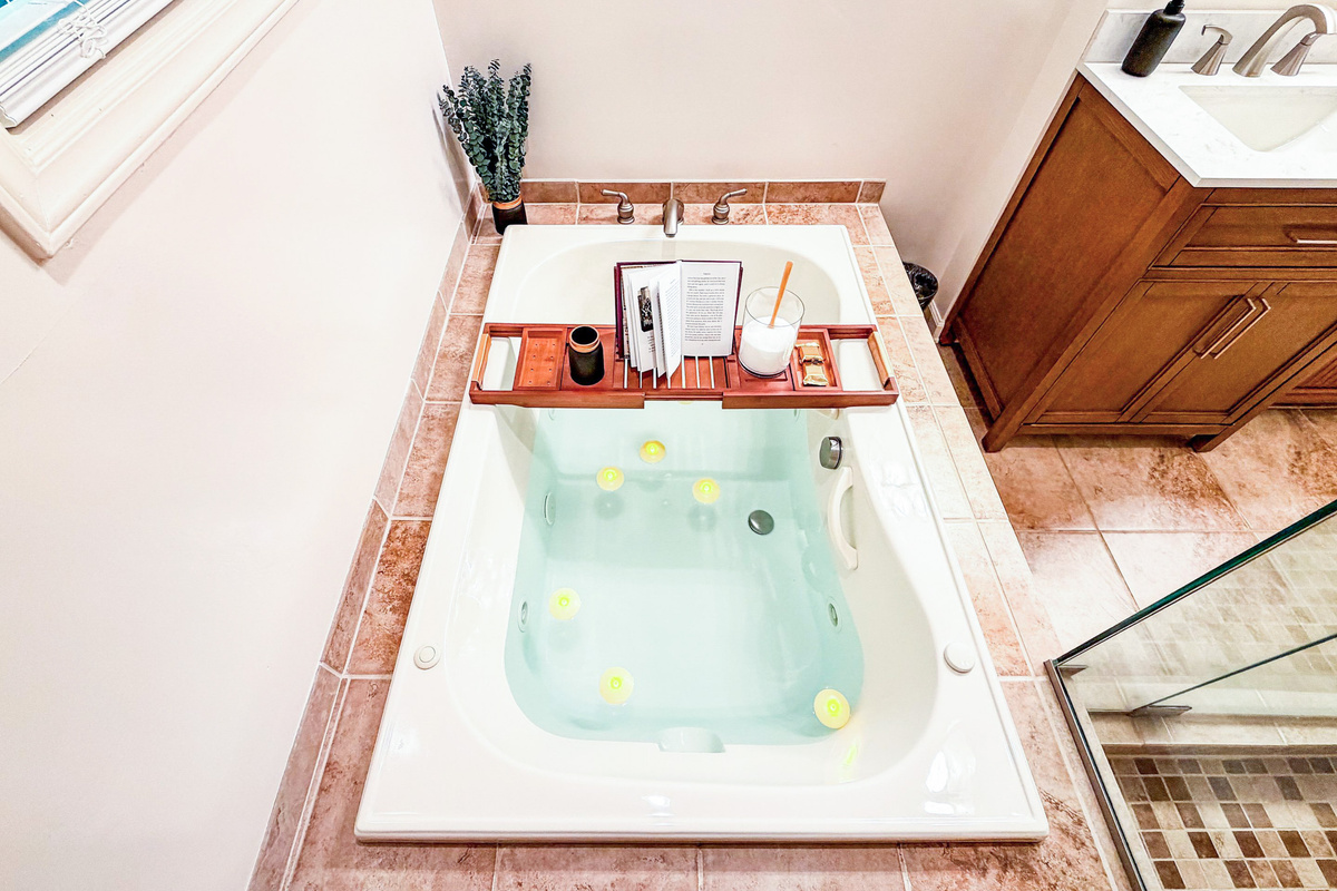 Indulge in a spa-like experience in the master 