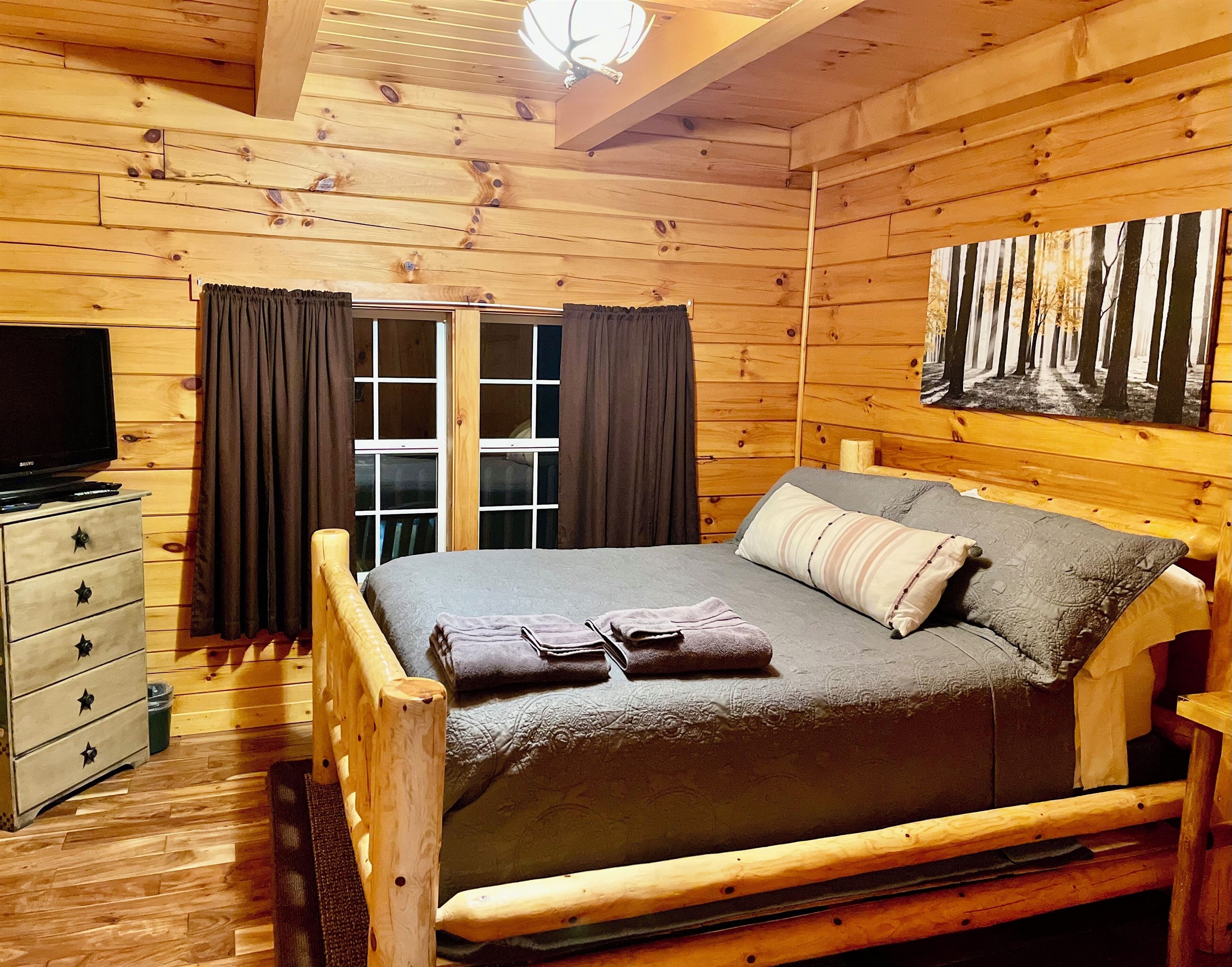 Master bedroom with a comfy queen bed.