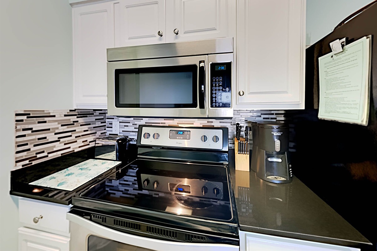 Kitchen with stainless appliances and Gulf view