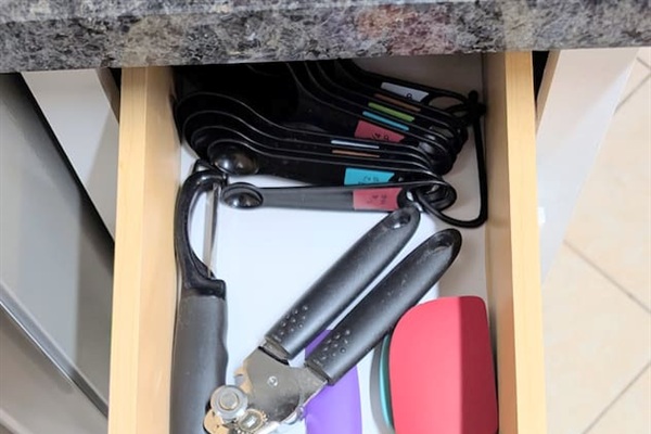  measuring cups and spoons • peeler • pizza cutter • can opener • wine/bottle opener • spatulas