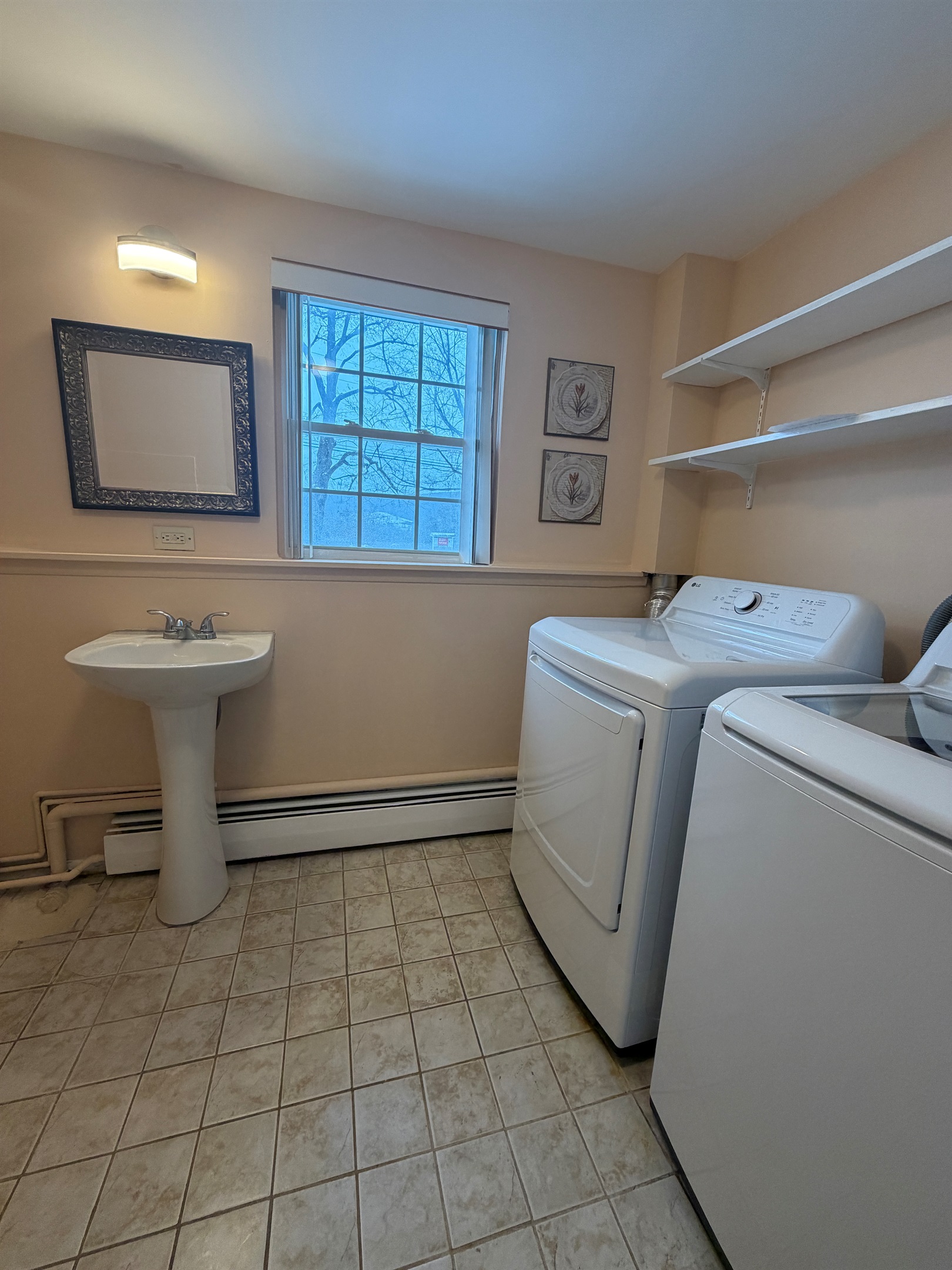 Lower level bathroom with shower and laundry