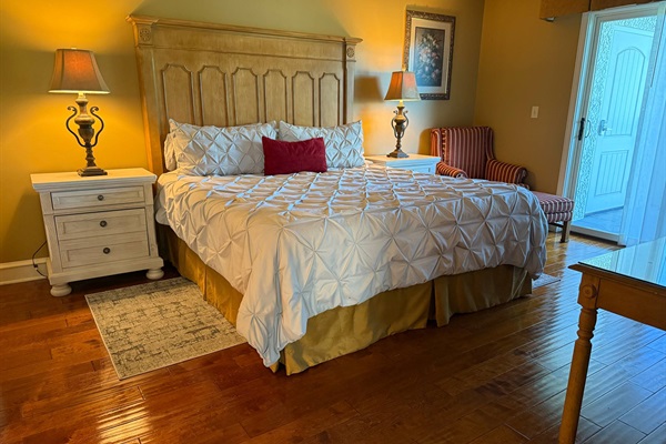 Huge Primary Bedroom Suite with large walk-in closet and balcony.