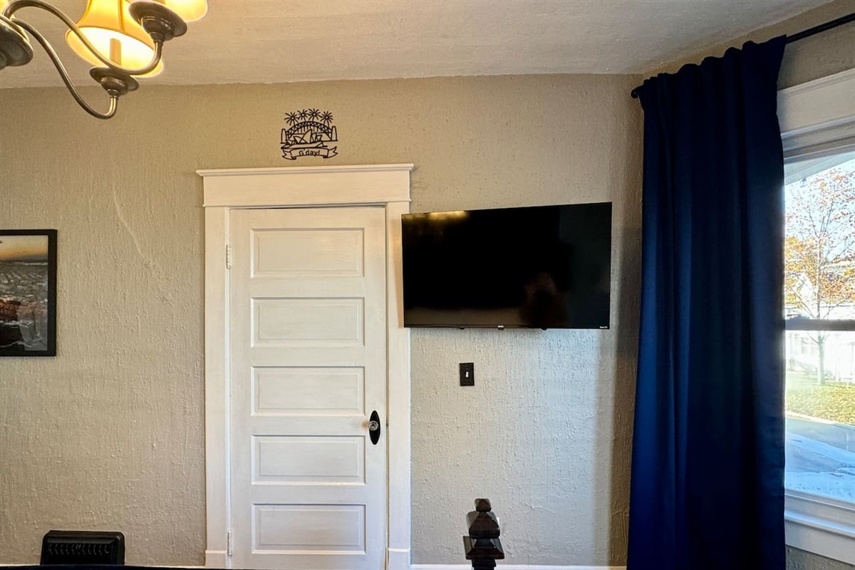 The Main Level Sydney Room offers a Roku smart TV.