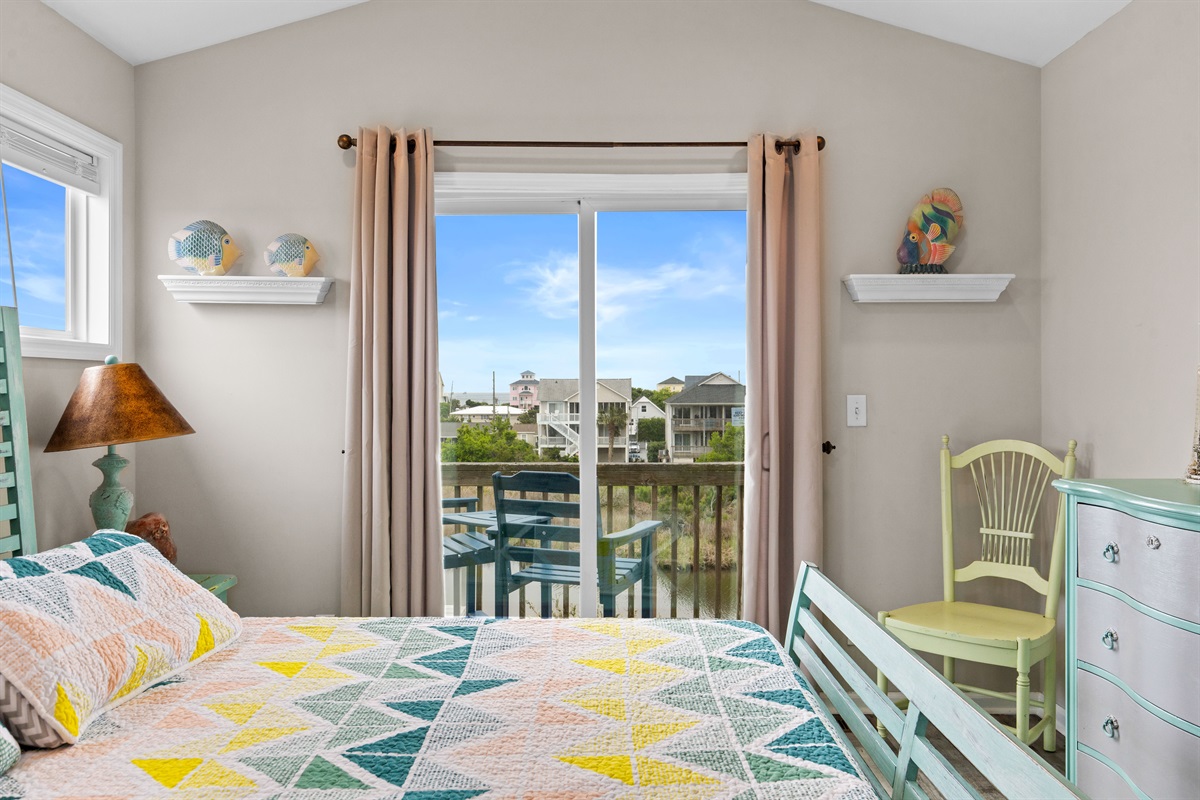 Private balcony access with relaxing water and neighborhood views