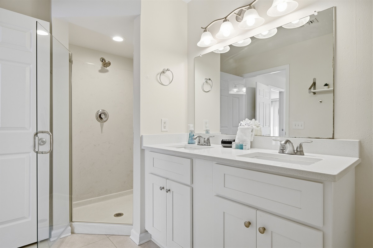 The Master bathroom has not only two vanities but two showers! One stand-up and the other is a shower/tub combo allowing two people to get ready at the same time!